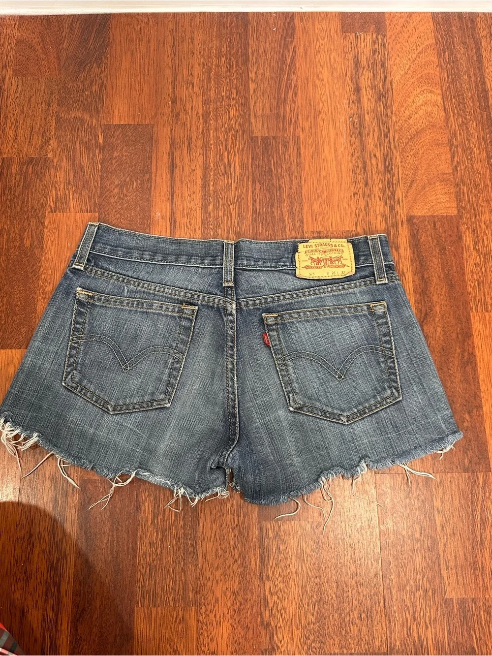 Vintage Y2K Levi’s low-rise cut-off denim shorts. Customized.